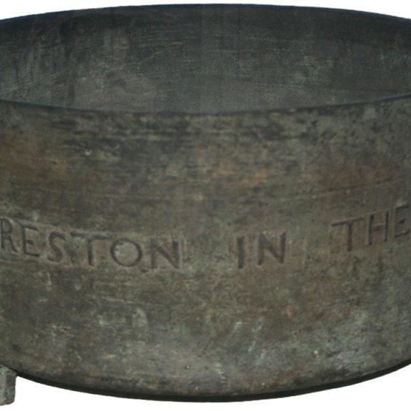 Iron basin with the words 'Preston in the...' engraved on it