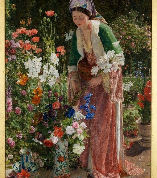 Well dressed Lady in garden tending to an array of flowers