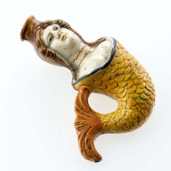 Novelty porcelain scent bottle in shape of mermaid with yellow and orange finn and brown hair