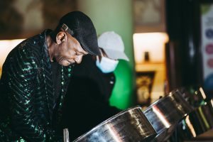 Two men playing steel drums