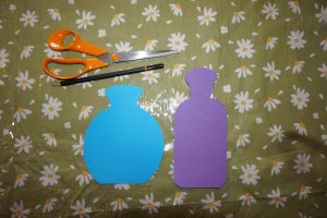 Cut out paper scent bottle shapes