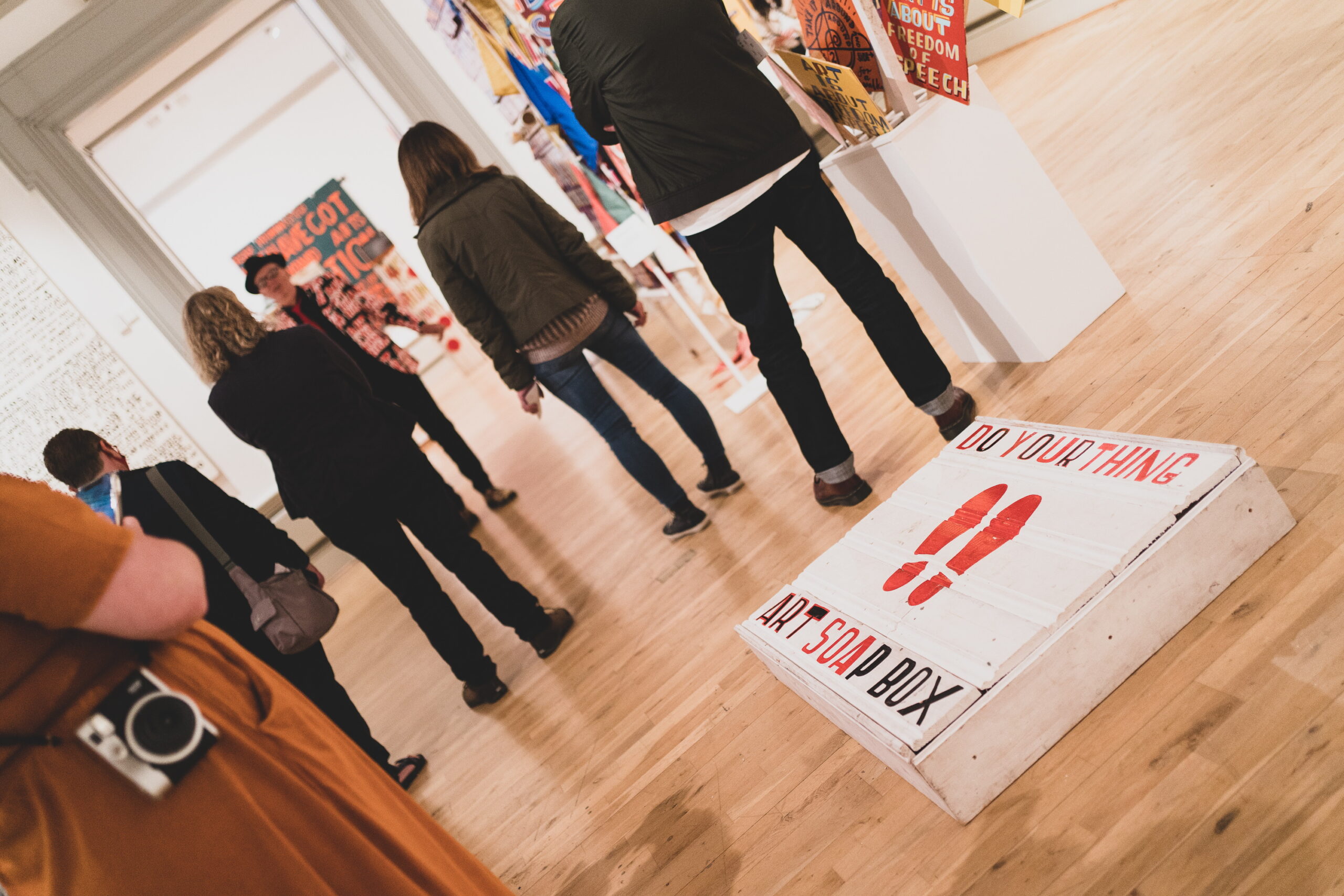 People visiting a contemporary art exhibition