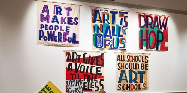 Artist banners on the gallery wall
