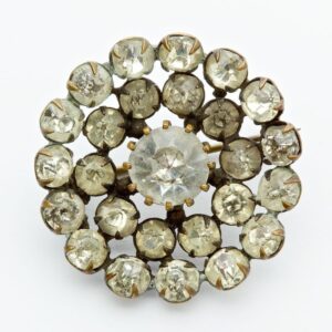 Circular brooch with inset diamonds