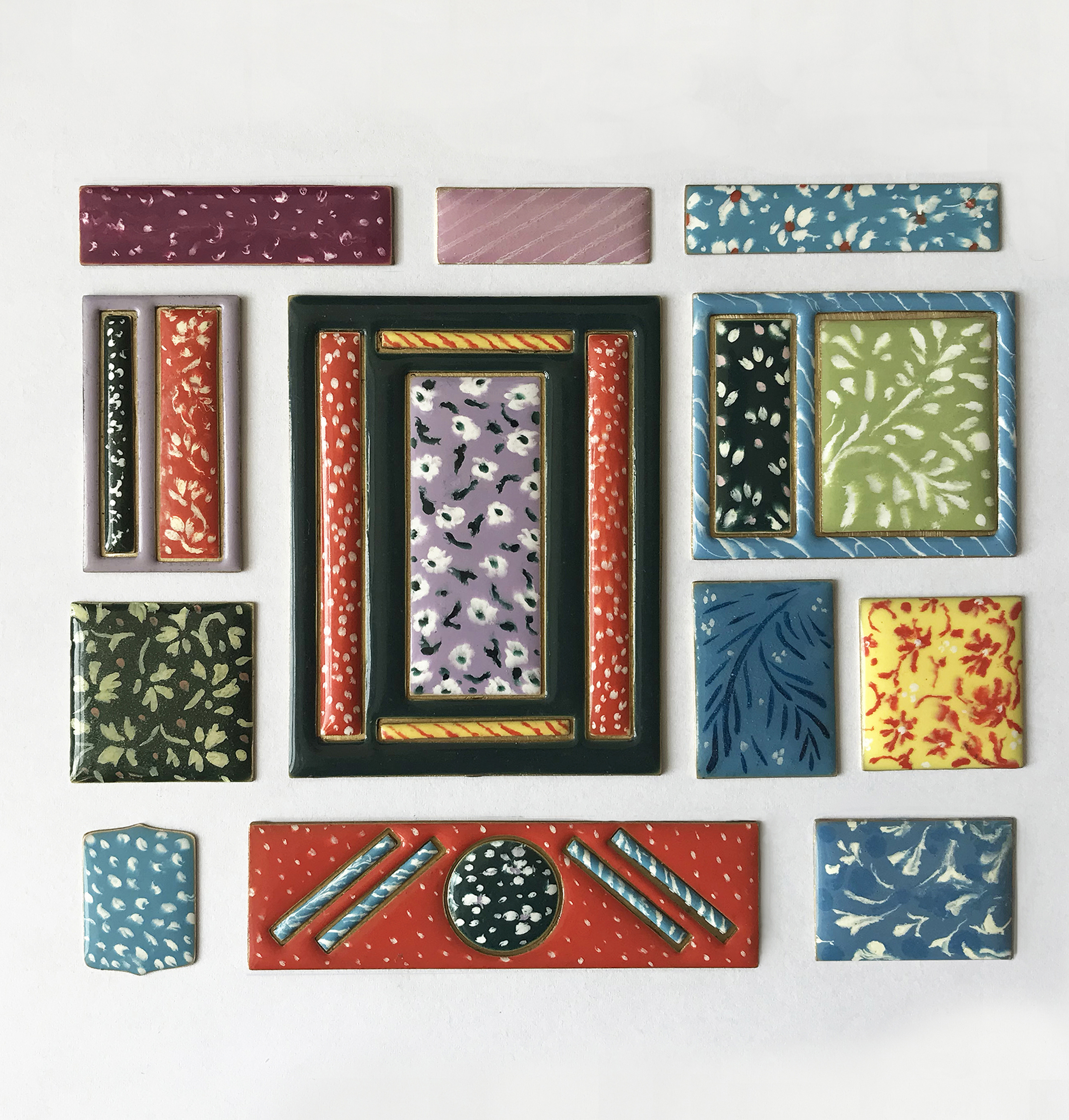 A selection of enamel artwork created by Hannah Sabapathy.