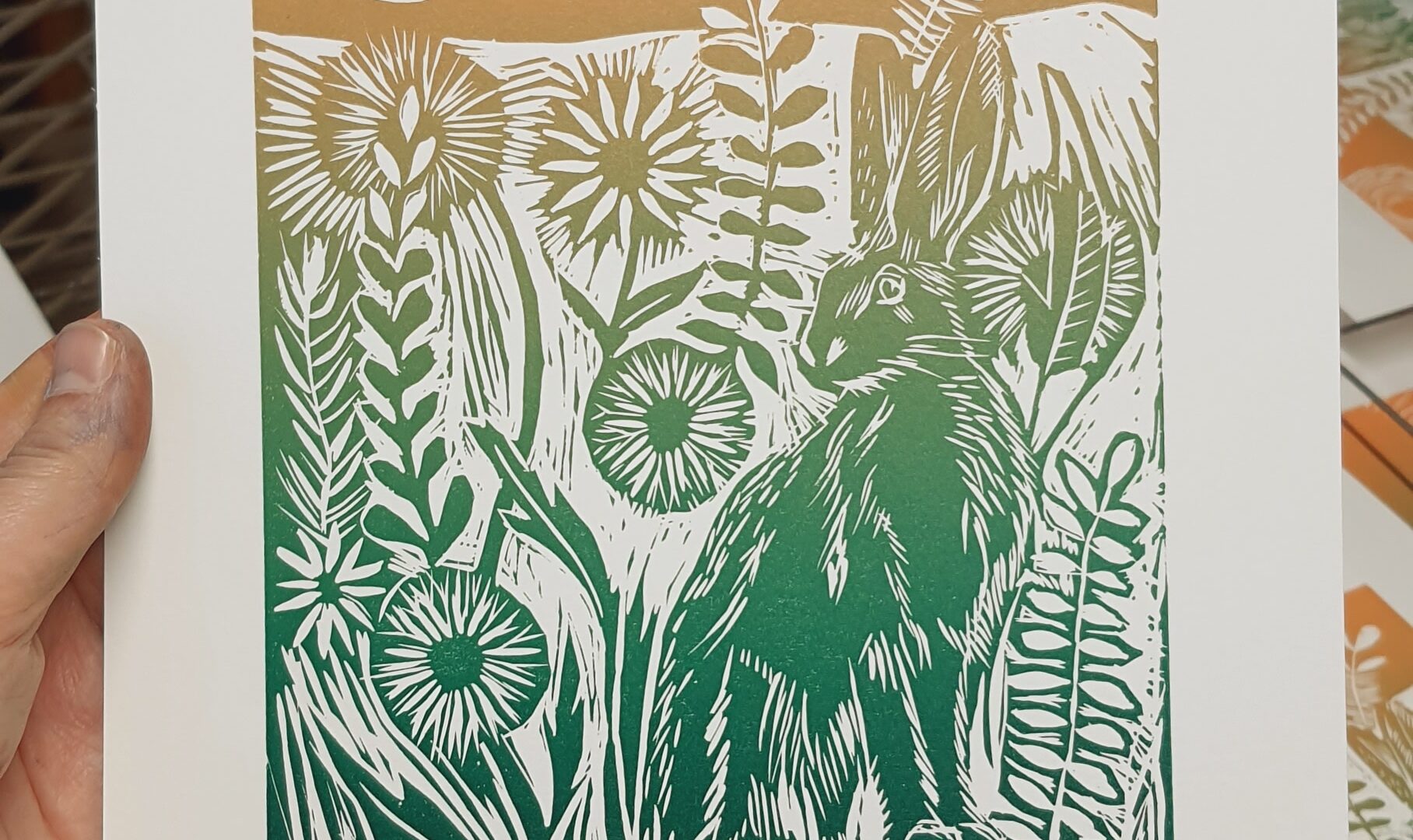 Image of a Linoprint rabbits in a field