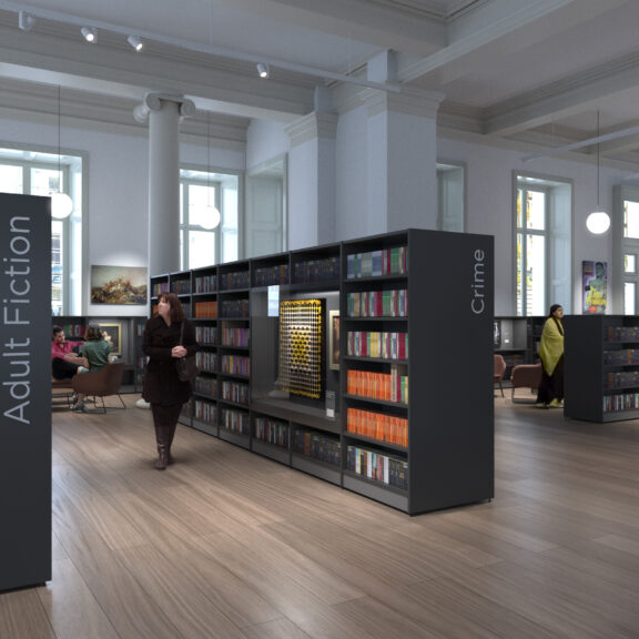 Rendered planning image of the Harris’ new Adult Library space, featuring black bookcases with an array of colourful books with artwork incorporated between the shelves. The themes ‘Adult Fiction’ and ‘Crime’ can be seen on the ends of the bookcases.
