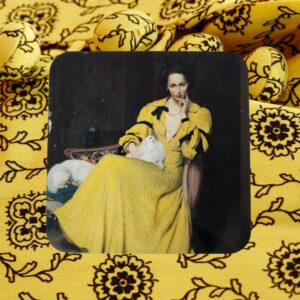 A coaster featuring Pauline in the yellow dress.