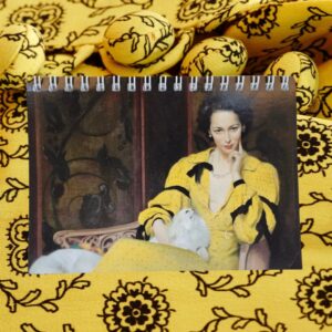 A notepad featuring Pauline in the yellow dress.