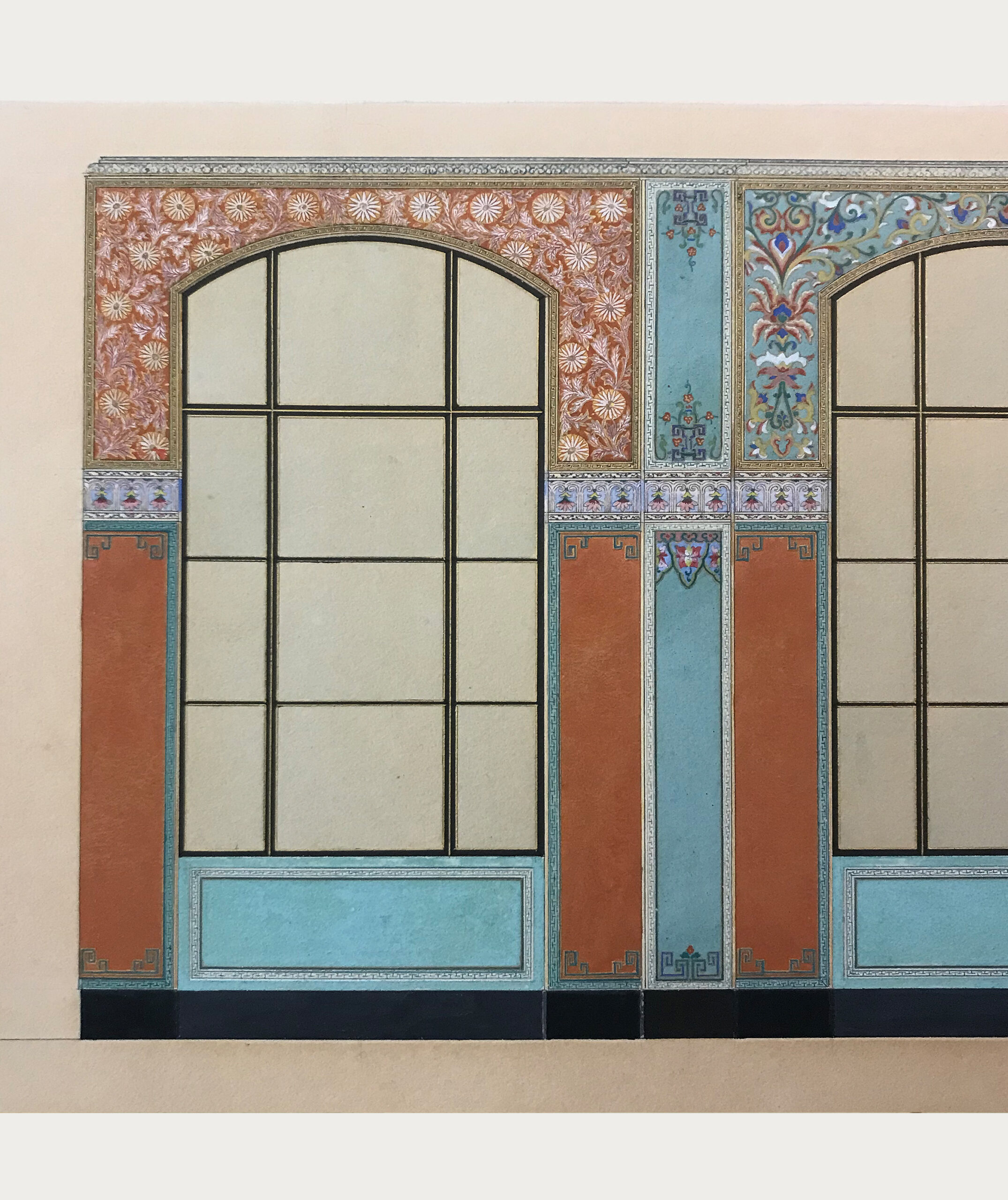 Image of a wide window architechure with bright orange ornate patterns on the walls.