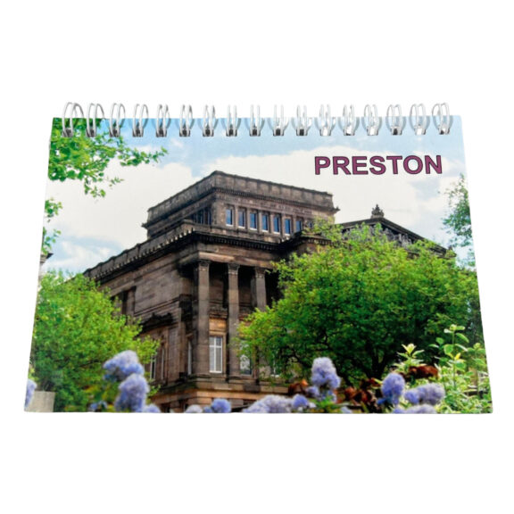 Image of a notepad with The Harris building on the front cover