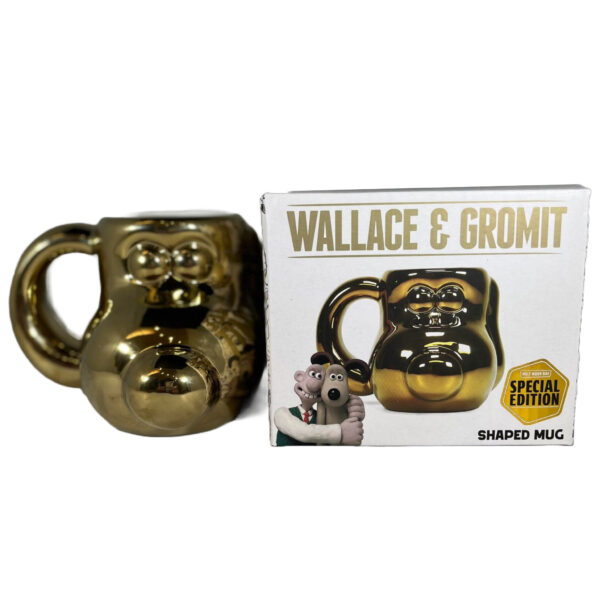 Gold mug of a dogs head.