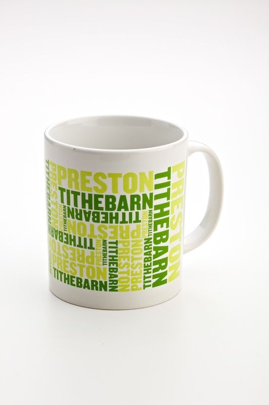 Image of a mug with green writing