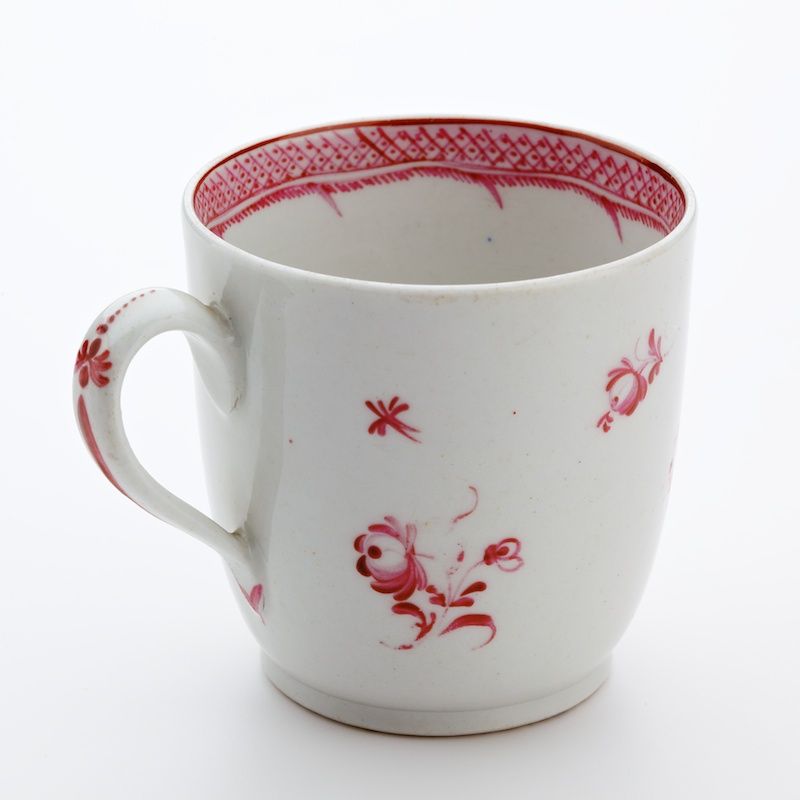 Image of a white mug with a red pattern