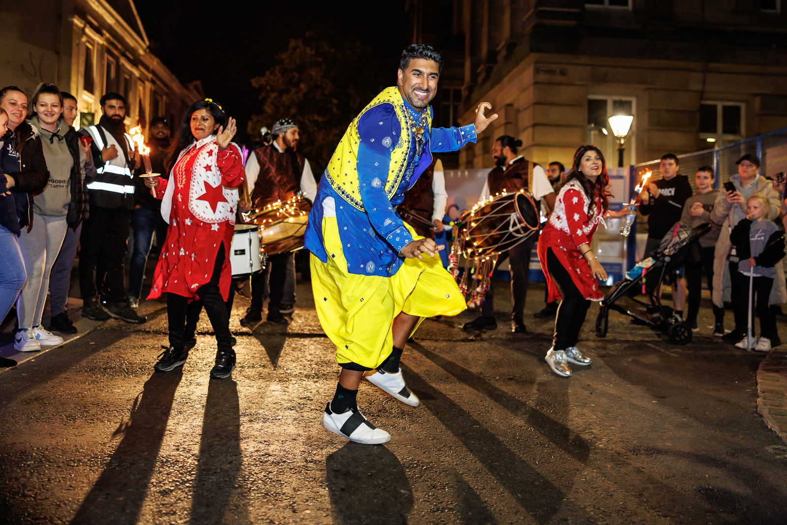 Image of people dancing in the street