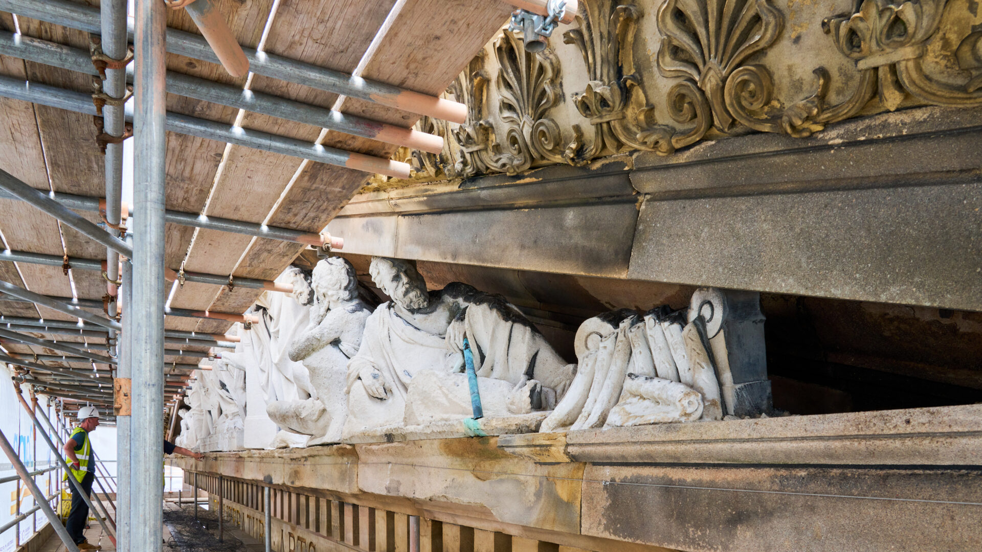 An image of the pediment with scaffolding.