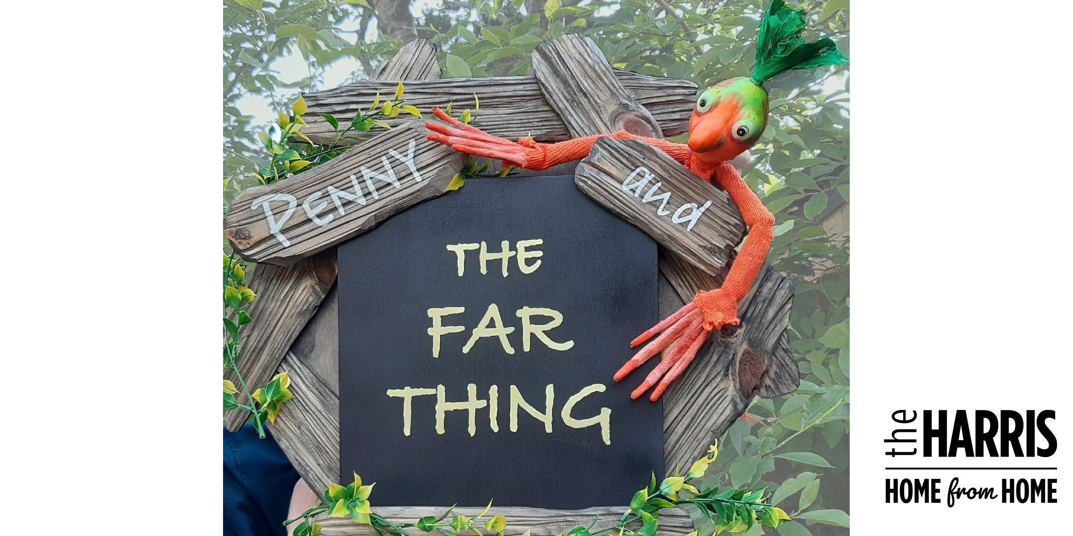 A puppet hangs over a sign that says Penny and the Far Thing.