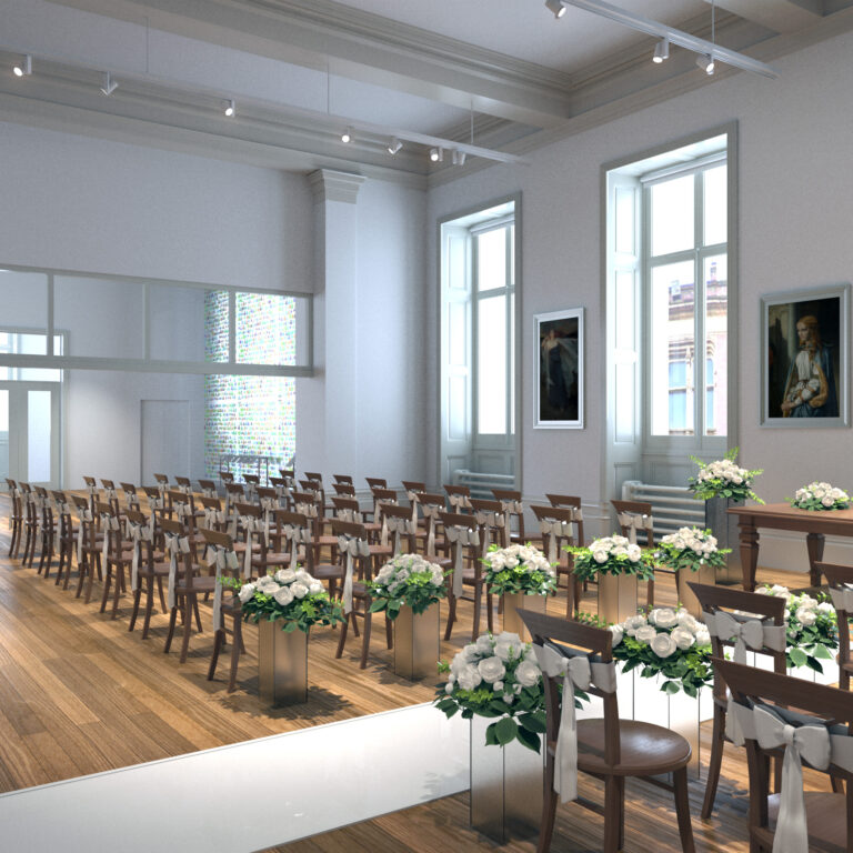 The wedding room, featuring rows of decorated chairs and flowers.