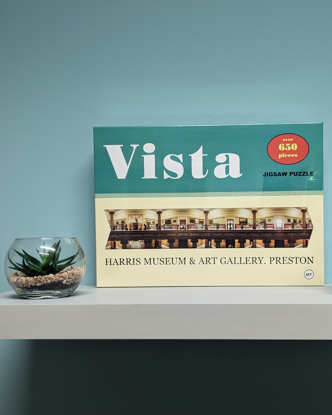 Harris jigsaw box placed on a shelf