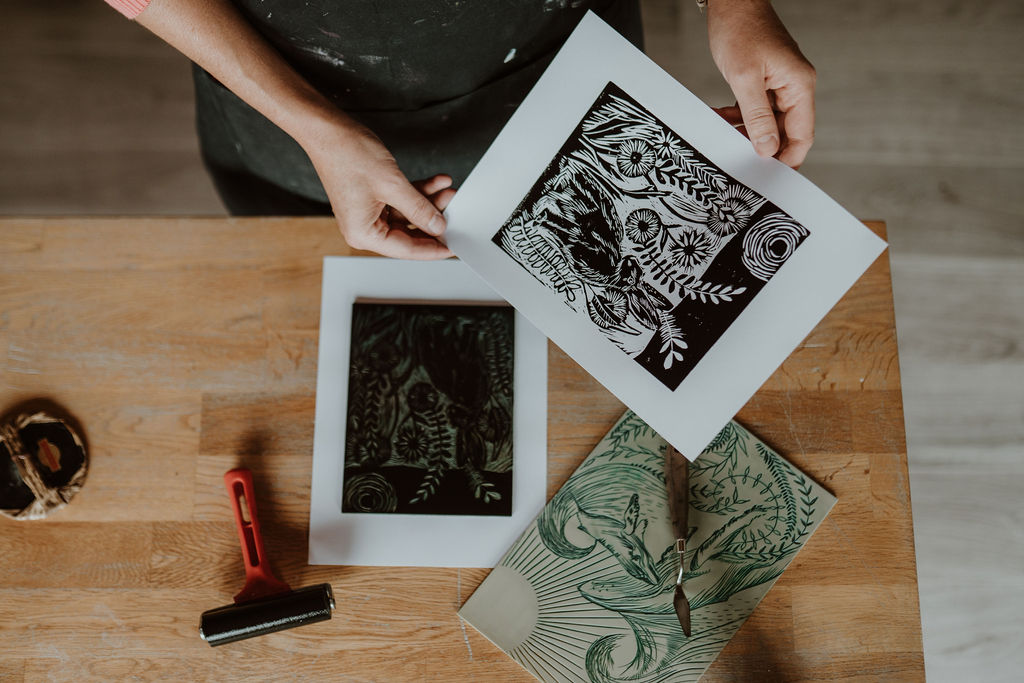 Printed patterns on three white sheets.