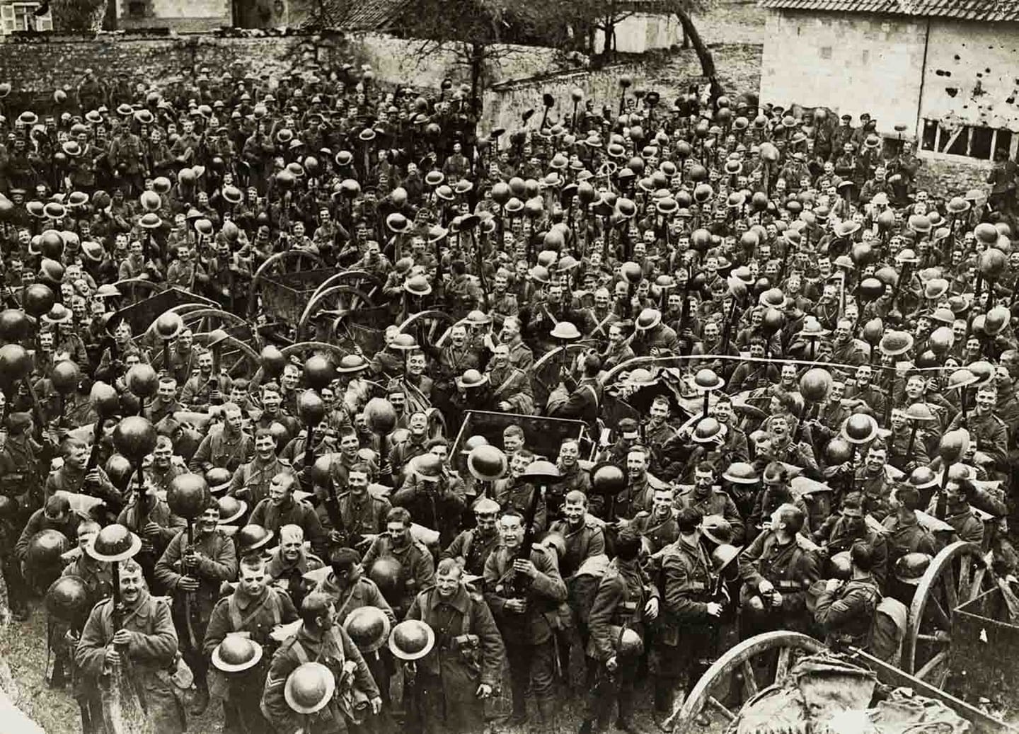 A black and white photograph of soldiers from 4th Loyal North Lancashire Regiment in France on their way to the trenches during World War One.