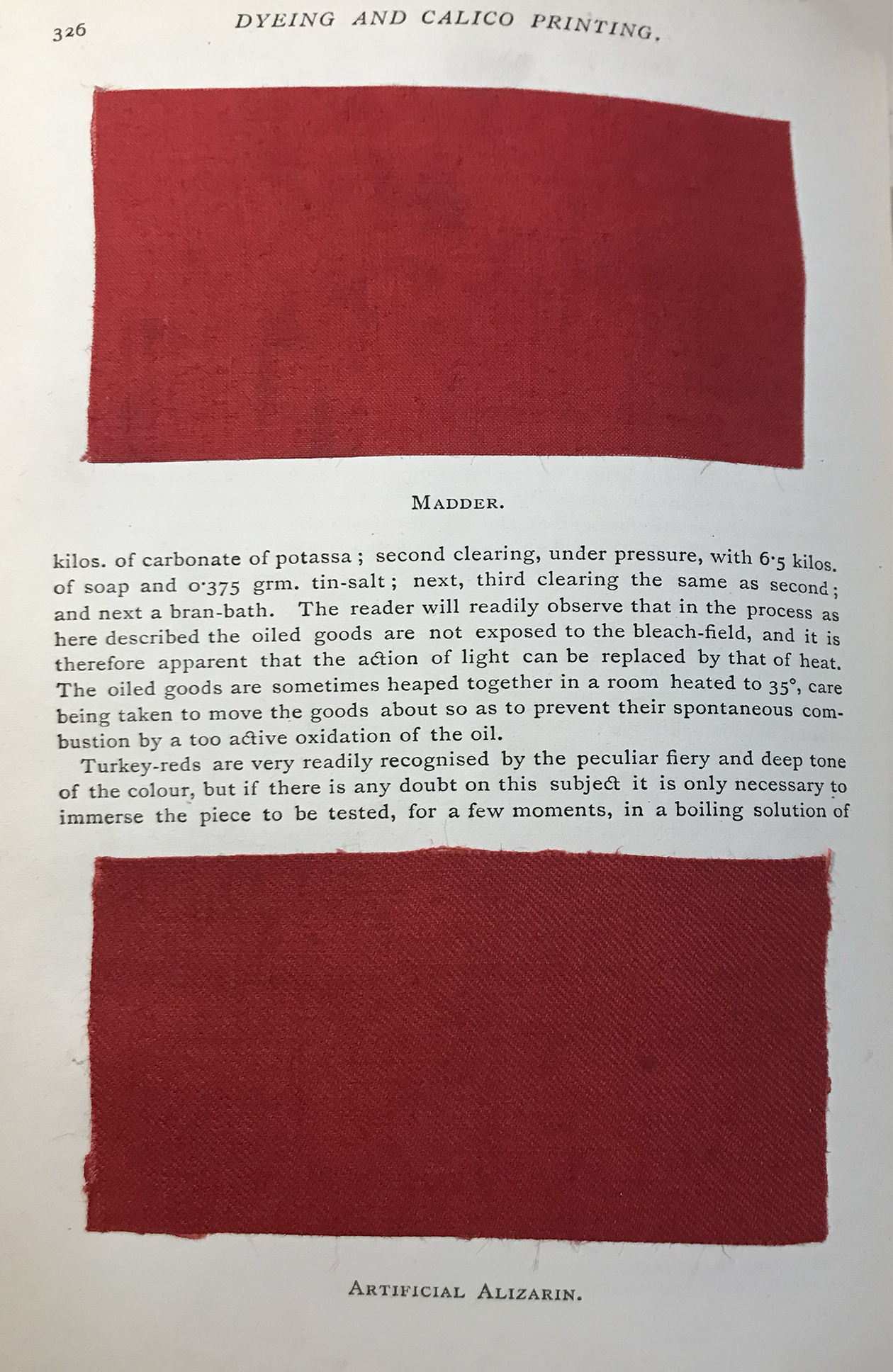 A page of a book showcasing pieces of red cloth.