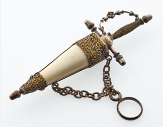 A scent bottle in the shape of a sword.