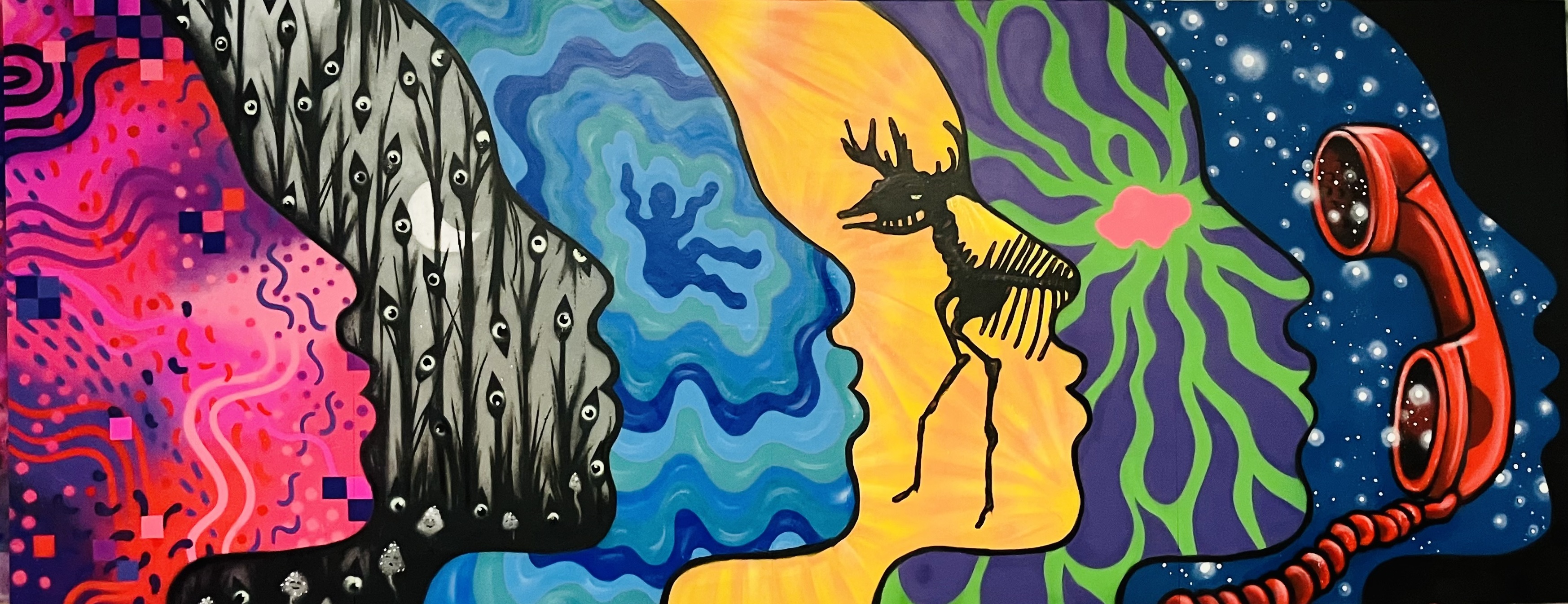 A colourful mural showing decorated side profiles of faces in a row.